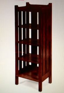 Stickley Brothers Magazine Stand #4802: Description: Original finish and Stickley label on bottom. Five shelves with slatted back and side. Dimension: 47"H x 16"W x 130"D Condition: Very good, structurally sound, minor stain. Provenance: We