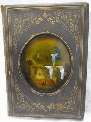 Papier Mache' Painted Book, 1850: Description: 19th century papier mache inlaid with mother of pearl and miniature painting embedded on front cover of book. Papier Mache binding, eighteen steel engravings, designed with descriptions b