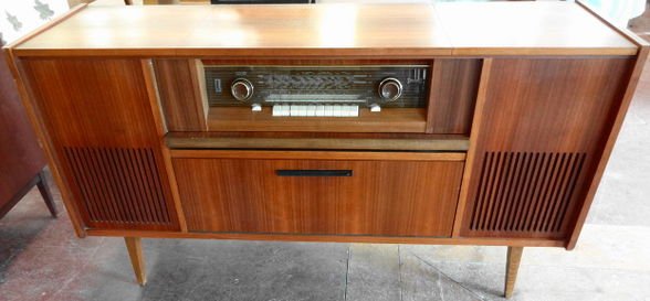 Telefunken Concerto 2284 Stereo Hi-Fi, circa 1960: Mid Century Modern Telefunken Concerto 2284 Stereo Hi-Fi. Floor model cabinet with Telefunken turntable and Radio. Paperwork included. (In German)Made in West GermanyCirca 1960Dimensions: 57" (W) x 31