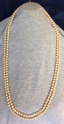 Miriam Haskell Faux Pearl Necklace, Signed: Vintage single strand, faux pearl costume necklace, stamped on tag and clasp.Dimension: 58"Condition: Very goodProvenance: Private Estate