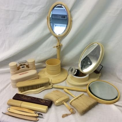 Shaving Mirror Collection, Celluloid & French Ivory: Shaving Mirrors and accessories, 13 pieces, celluloid and French Ivory, circa 1920's Collection consists of: (2) table top standing shaving mirrors, single mirror top, (3) straight razors with 2 holde