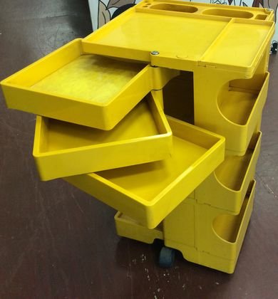 Mid-Century Italian Joe Colombo Yellow Service Cart: Joe Cesare Colombo, (Italian Industrial Designer, 1930-1971), Signed underneath, "Bobby Cart", designer Joe Colombo, circa late 1960's, yellow plastic with swing out trays, side shelves, and bins, rol