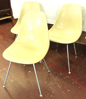 Eames Molded Fiberglass Shell Chairs (3): Labelled: Charles Eames, Vitra Dimensions: H 31" X W 18.25" D 18.5" Condition: Good, age appropriate wear and fading.