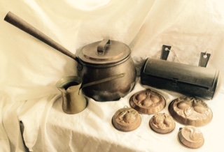 Primitive Country Kitchen, Brass, Copper, and Tin: Copper pot with lid, 5 copper decorative molds, candle cylinder tin, brass sauce measure #6 Condition: Overall good and typical for age, large copper pot lid is dented underneath. Provenance: Milford,