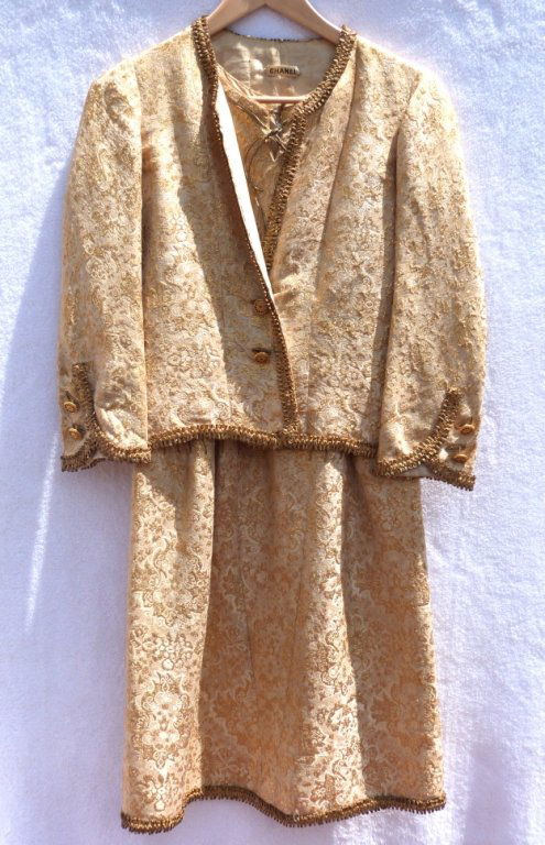 Vintage Chanel Couture Dress and Jacket: Two piece gold trimmed Dress with original buttons. Buttons were designed by Coco Chanel based on a pattern from her childhood .