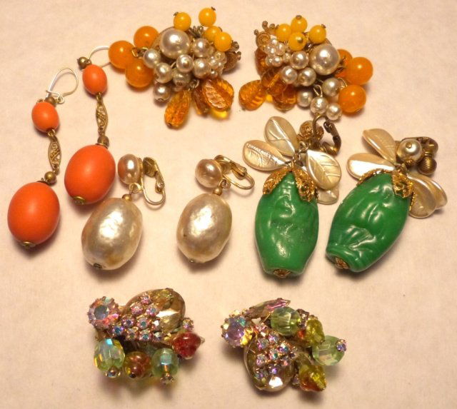 Miriam Haskell Group of Five Pairs of Earrings: (1) Miriam Haskell earrings with green glass drops and pearl leaves, signed. (2) Baroque earrings with faux pearl drops. (3) Miriam Haskell earrings with yellow topaz and pearl bouquet cluster, signed