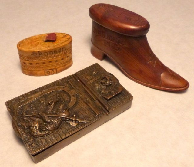 Three Assorted Wooden Snuff Boxes: (1) Scandinavian Bronze snuff box. (2) Carved Birch wood snuff box with removable lid, dated 1901, Bermuda. (3) Carved wood shoe form snuff box, with carved star and heart decoration, Bermuda 1902.