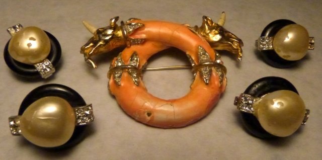 Kenneth Jay Lane "Intertwined Unicorns" Bracelet: Kenneth Jay Lane Pearl, Black, and Rhinestone Button Earclips (Two Pairs) Kenneth Jay Lane Coral Colored, Gold, and Rhinestone Bracelet "Intertwined Unicorns" marked KJL