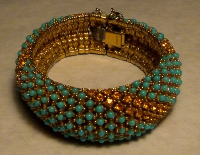 Ciner Gold Tone and Turquoise Color Bracelet: Ciner Gold Tone and Turquoise color Articluated Bracelet, marked Ciner
