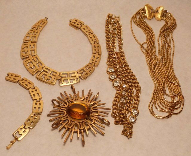 Modernist Style Large PIN, Monet Linknecklace,: three pieces, one large calder style pin/pendant with large citrine. one link necklace, marked Monet 9 strands, one gold colored metal link necklace with heart shaped glass stones good condition.