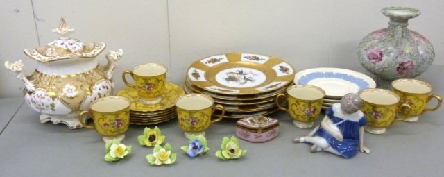 Group of Assorted Porcelain Table Articles: Including a figure of a girl, bread plates, Wedgwood saucers, Limoges trinket box, etc. good condition