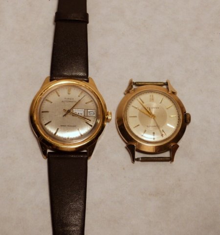14k Gold New Haven Watch & Timex Watch: 14k New Haven wristwatch with center seconds; together with a Timex gold filled Wristwatch.