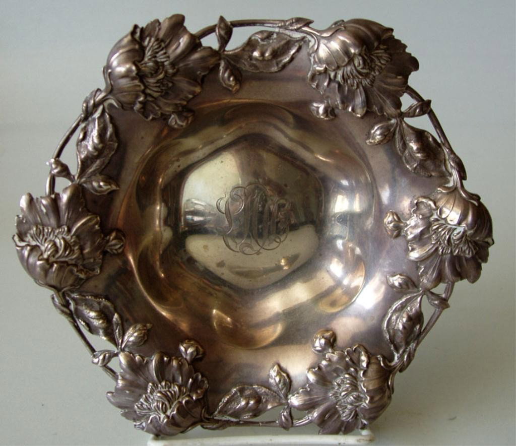 ORNATE MARSHALL FIELD STERLING BOWL: Fine Marshall Field & Co Art Nouveau reposse floral Sterling poppy bowl with monogram. Approx. 1½"H x 7"dia. Impressed marks to underside. TW approx 6.0 oz. Pleasing rich dark patina.