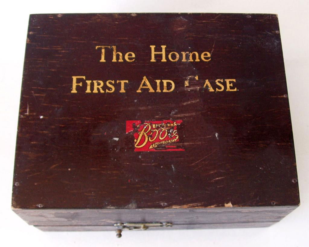 VINTAGE BRITISH HOME FIRST AID CASE: Vintage 'Boots' wood cased Home First Aid Kit with instruction sheets & contents. Case measures 3½" x 6" x 7½".