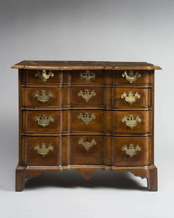 CHIPPENDALE WALNUT BLOCK-FRONT CHEST OF DRAWERS: The Oblong top with sloped-molded edge, above a case with square blocking; with four conformingly-shaped graduated drawers below; with a shaped drop pendant, the tall bracket feet flanked by