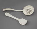 CREAMWARE UTENSILS: A LADLE AND A SPATULA