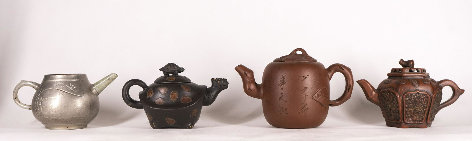 Four Yixing Teapots (1 of 14)