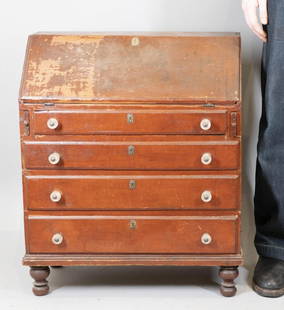 The Leffingwell Family Child's Cherrywood Desk: New London County Connecticut, probably Norwich area, early 19th century The red surface of the cherrywood with very early probably original reddish wash, the hinged slant-lid opening to a fitted