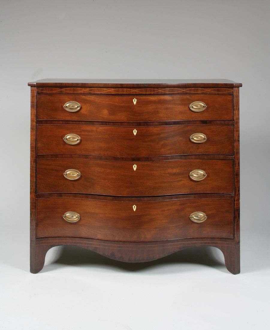 A Federal Inlaid Mahogany Serpentine Chest of Drawe: A Federal Inlaid Mahogany Serpentine Chest of Drawers Norfolk, Virginia, 1790-1810 Exhibiting all of the stylistic and structural features of the currently acknowledged examples of the Norfolk Group,