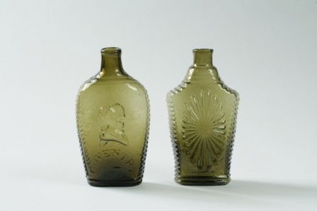 Two Olive-Green Glass Flasks: Two Olive-Green Glass Flasks The first, a one pint starburst (h. 7 1/4 inches), The second, depicting Lafayette with ""LAFAYETTE / T.S."" and Clinton with ""AE WITH CLINTON \ COVENTRY \ C-T"" inscribe