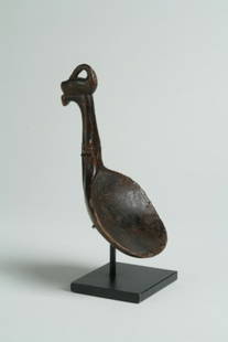 Preening Swan Effigy Ladle: Preening Swan Effigy Ladle Eastern Great Lakes Woodlands, second-half 18th century This delicate example has a proportionally large bird with openwork between the neck and body- the waisted handle