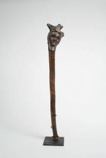 Two Penobscot Clubs (2): Two Penobscot Clubs Large Penobscot Club with Face 19th century Traditional Penobscot (Maine) club of exceptional character and form. This early example likely to pre-date the late 19th and early