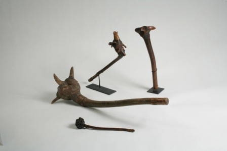 Four Penobscot Root Clubs (4): Four Penobscot Root Clubs Late 19th/ early 20th century Comprising, a monumental example with heavy chip carving on the handle and a single large horned forest creature carved into the large burl,