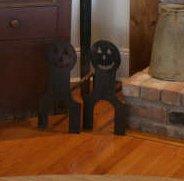 Pair of Pumpkin Head Iron Andirons: American, first half 20th century H. 16 in; D. 15 3/4 in. Estimate: $300 - $600 Collectors Joanne and Jeffrey Klein enjoy the eclectic mix of American folk art, painted furniture and modern sculpture