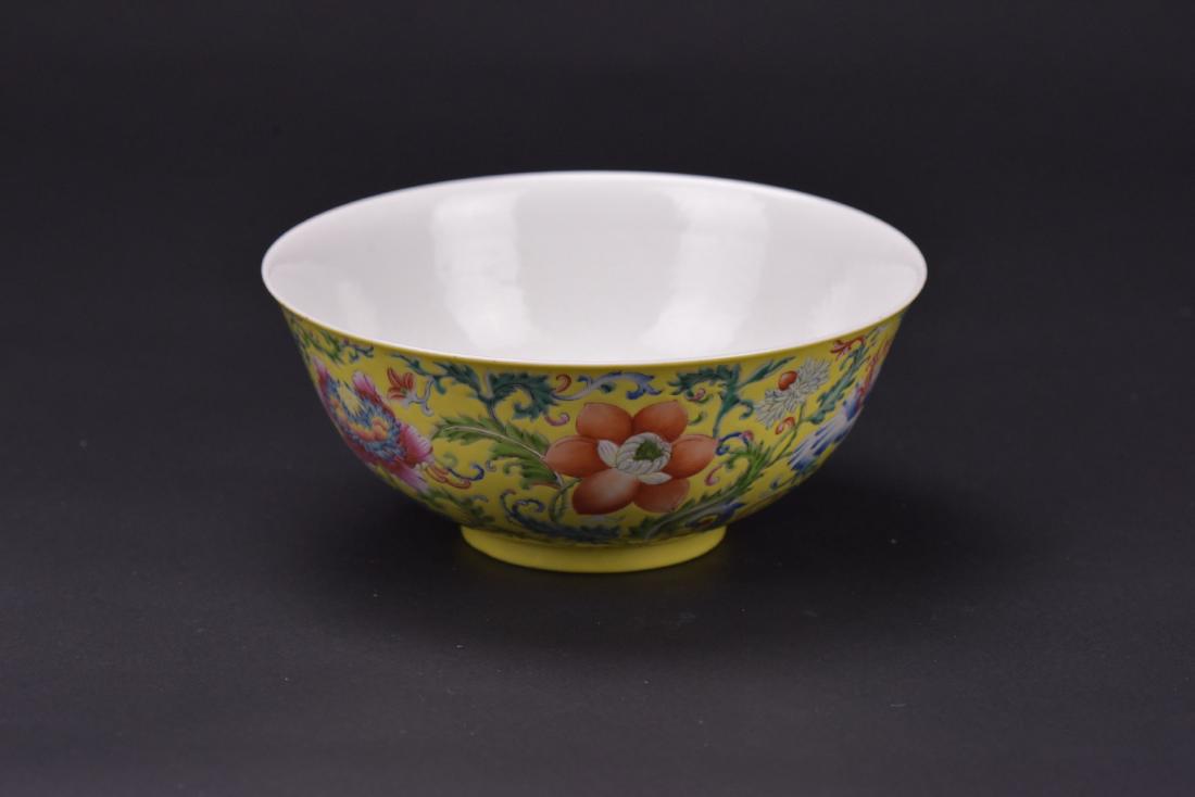 Qing - A Yellow Ground Famille-Glazed “Flowers” Bowl (1 of 4)