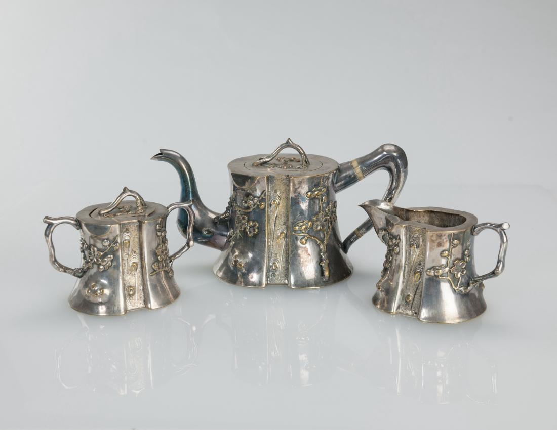 Republic-A Set Of Three Silver Gilt Tea Set, With: Republic-A Set Of Three Silver Gilt Tea Set, With Mark(Guantanamo Gong Si) H:7-9.5 cm (2 7/8－3 3/4 in) 民國-銀壼三件一組 “廣安&