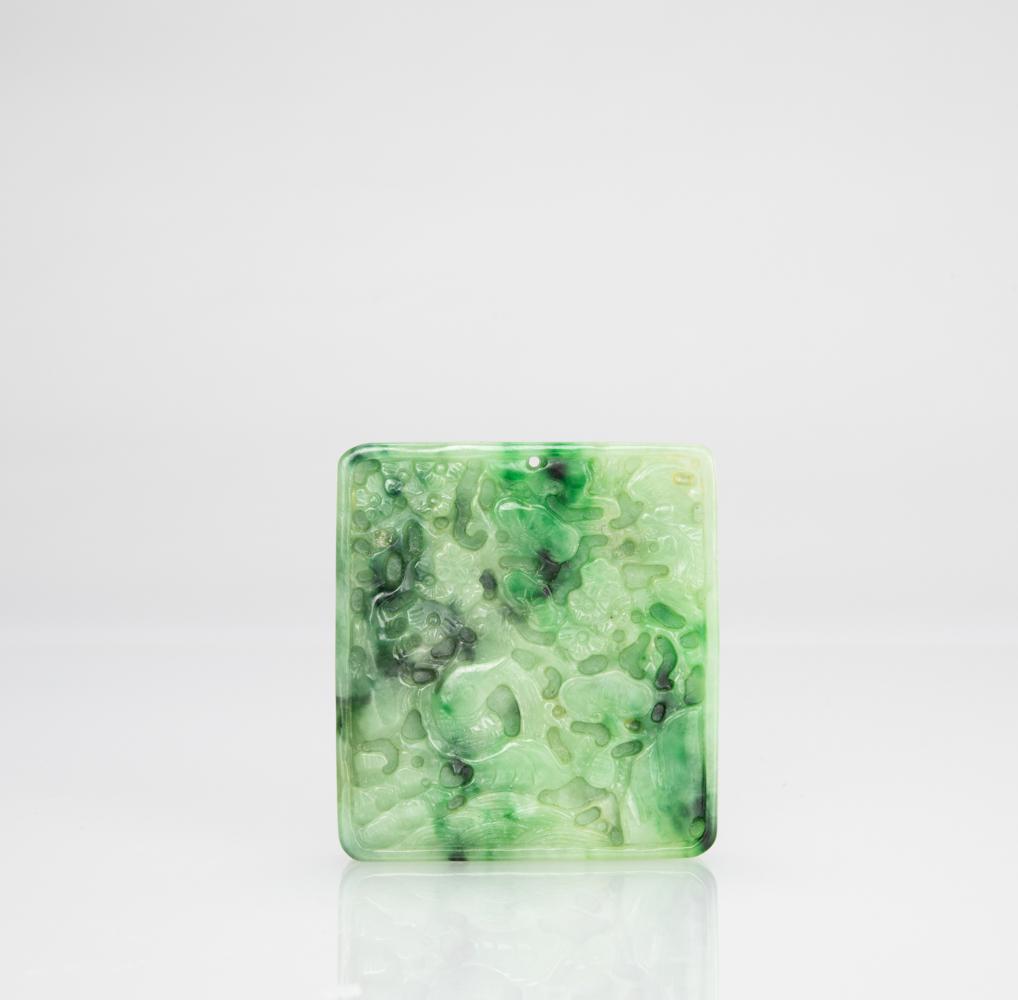 A Green Jadeite Carved â€˜ Koi and Lingzhiâ€™ Pendant: A Green Jadeite Carved ‘ Koi and Lingzhi’ Pendant 6.5 X 6 X1.1 cm 翡翠雕靈芝鯉魚牌 Provenance 來源：舊金ा