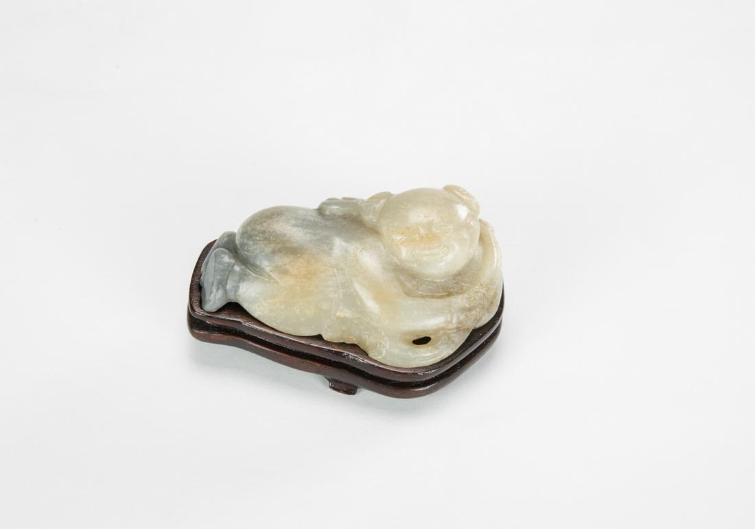 Song-A White Jade Carved Boy Holding Ruyi (woodstand) (1 of 7)