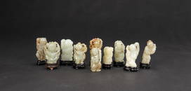 Qing - A Group Of Ten White Jade Carved Childs (9 woodstand)