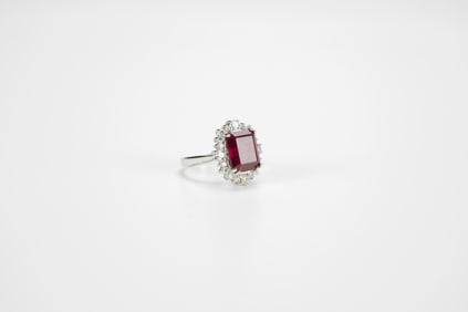 A Ruby Mounted With Diamonds And 14k White Gold