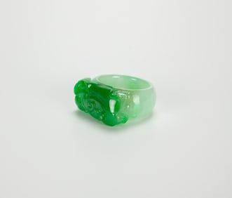 A Semi-Translucent Green Jadeite Ring.