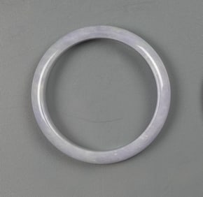 A Lavender Jadeite Bangle.