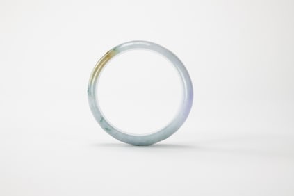 A Lavender Jadeite Bangle.