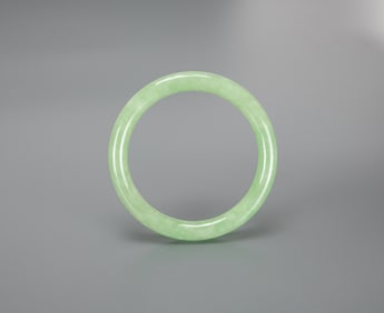 A Apple Green Jadeite Bangle.