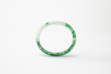 A Oval Shape Jadeite Bangle.