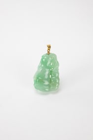 A Green Jadeite Carved Bamboo Pendant.