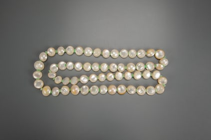 A Mother Of Peral Beads And Jadeite Beads Necklace