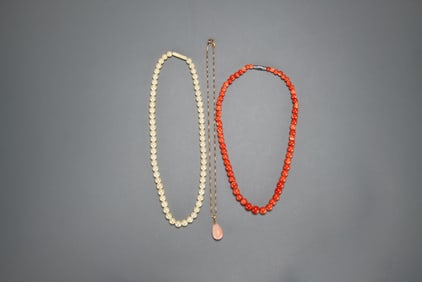 A Group Of Three Necklace.