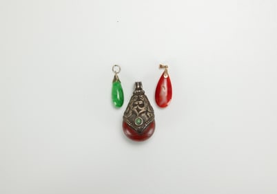 A Group Of Three Pendant.