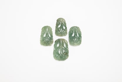 A Group Of Four Jadeite Pendant.