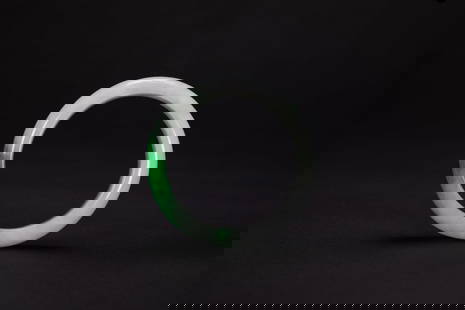 A Natural Green Jadeite Bangle: A Natural Green Jadeite Bangle 外 D: 7.3 cm 內 D: 5.6 cm 正陽綠翡翠手鐲 ( 天然翡翠） Provenance 來源 : &
