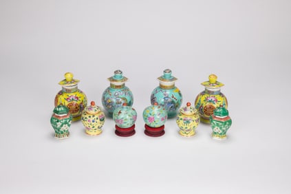 A Group Of Ten Famille Glazed Small Cover Jars