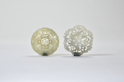 A Two White Jade Carved’ Dragon and Flowers’ PendantsLate Qing