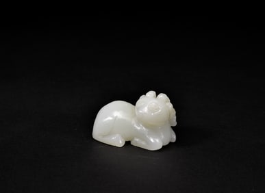 A Chinese White Jade Carved Ram, Qing Dynasty.