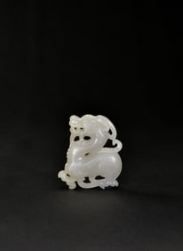 A White Jade Carved ‘Dragon’ pendant