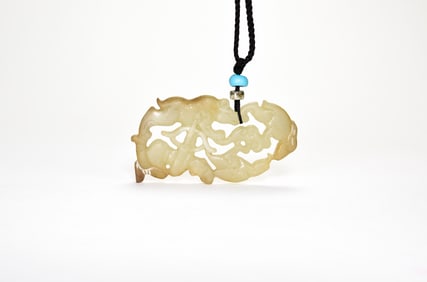 Qing - A White Jade Carved ‘Hunter’ Pendant
